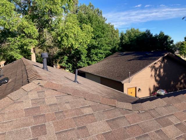 Roofers on roof in Boise, Idaho